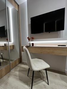 TV a/nebo společenská místnost v ubytování Kensington Apartaments Poznań - Centrum, Polna, Jeżyce self check-in 24h