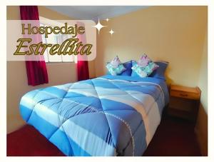 Postel nebo postele na pokoji v ubytování Hospedaje Estrellita