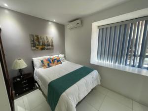 Postel nebo postele na pokoji v ubytování LOFTSCACAO APARTMENTS, Villas Cacao, near to Playa Bonita Limón