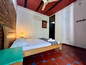 Postel nebo postele na pokoji v ubytování Sana Mar Hostel & Eco-Café