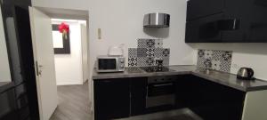 Kuchyň nebo kuchyňský kout v ubytování Vatican City San Peter quiet and lovely apartment