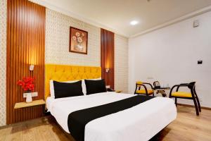 Postel nebo postele na pokoji v ubytování Super Hotel JP Palace