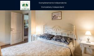 Postel nebo postele na pokoji v ubytování A'Loro B&B