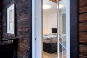 Postel nebo postele na pokoji v ubytování Defereggerhof St Veit in Defereggen