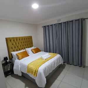 Postel nebo postele na pokoji v ubytování Falconbridge Properties + 34 fotografií