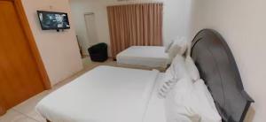 Postel nebo postele na pokoji v ubytování Las Palmas Beach villa 0230
