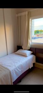 Postel nebo postele na pokoji v ubytování Eco Towers Resort