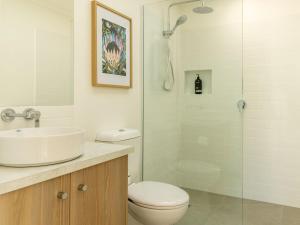 a bathroom with a sink and a toilet and a shower at Lyons in Port Fairy +9 photos