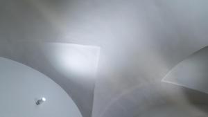 a white ceiling with a light in the middle at Elephant and Castle - Exclusive Holiday Home in Catania