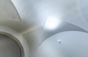 a ceiling in a building with a light on it at Elephant and Castle - Exclusive Holiday Home in Catania