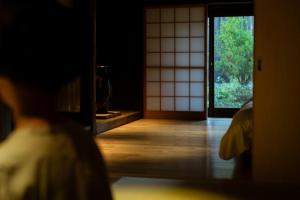 Letto o letti in una camera di Yasoichi