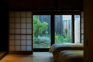Letto o letti in una camera di Yasoichi