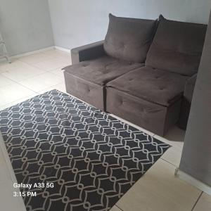 Uma área de estar em Família BRUMAR Condominio Dellos