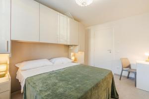 Ένα ή περισσότερα κρεβάτια σε δωμάτιο στο Bellaria Palace - Near the city of Ferrari