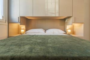 Ένα ή περισσότερα κρεβάτια σε δωμάτιο στο Bellaria Palace - Near the city of Ferrari