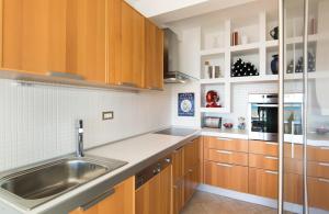 A kitchen or kitchenette at Apartment Sun247shine