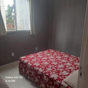 Uma cama ou camas num quarto em Família BRUMAR Condominio Dellos