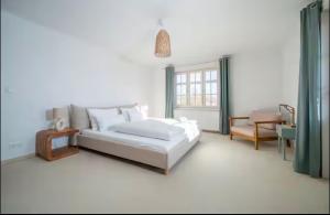 Postel nebo postele na pokoji v ubytování ღLIBORIA I Als Gruppe in Uffing I 4 min zum See I Sauna