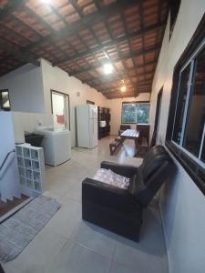 Ruang duduk di Casa de praia com jacuzzi