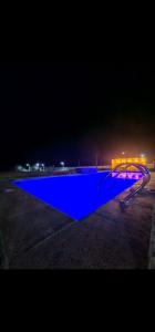 Bazén v ubytování Glamping come rest olimpo nebo v jeho okolí