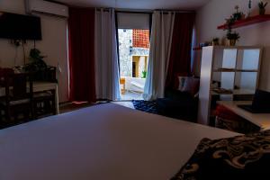 Letto o letti in una camera di OCEANPARADISE to you ALBATRO l Y ll