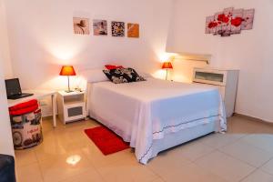 Letto o letti in una camera di OCEANPARADISE to you ALBATRO l Y ll