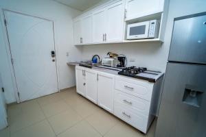 Cucina o angolo cottura di OCEANPARADISE to you ALBATRO l Y ll