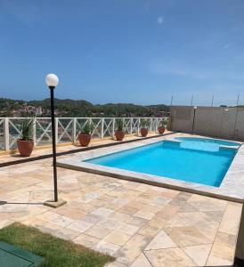 パルナミリンにあるVillaggio Di Porto Fino Praia Pirangi Norteの家の屋上にあるプール