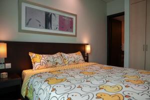 Somerset Bencoolen Singapore客房内的一张或多张床位