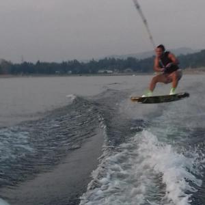 a man on a water board in the water at Condominio Monte Molinos - La Vista in Villa Ciudad de America +9 photos