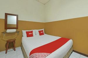 Postel nebo postele na pokoji v ubytování Meple Hotel Skudai