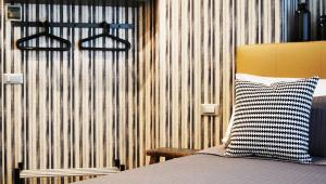 Postel nebo postele na pokoji v ubytování Serendipity Rooms