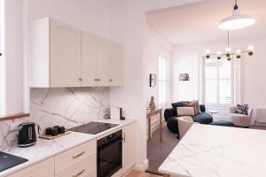 Η κουζίνα ή μικρή κουζίνα στο Harrington House luxury apartment in CBD +26 φωτογραφίες