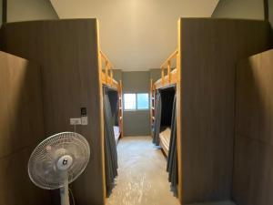 Katil atau katil-katil dalam bilik di 撒花咖啡民宿 Sakinu & Hanaku Cafe' Hostel
