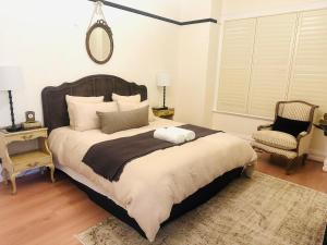 Leura's Magical Manderley客房内的一张或多张床位