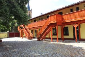 a building with stairs on the side of it at L&L Skaters Home in Langenlipsdorf