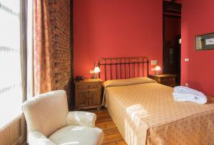 Postel nebo postele na pokoji v ubytování Hotel La Posada Regia
