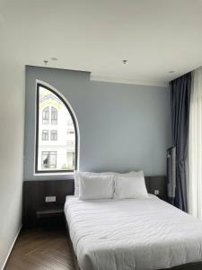 Katil atau katil-katil dalam bilik di Sky View Memory Inn