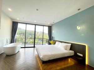 Katil atau katil-katil dalam bilik di Sky View Memory Inn