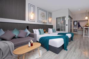 Postel nebo postele na pokoji v ubytování Best Time Pool Suites