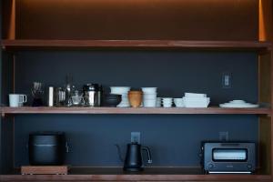 Una cocina o cocineta en GOTO island ROKGOUTEI五島列島福江島のモダンな一棟貸ヴィラ