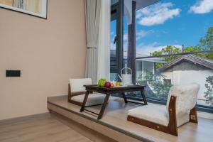 Balkoni atau teres di 丽江云栖意景智能花园客栈