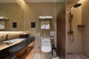 Vannituba majutusasutuses Guangdong Hot Spring Hotel