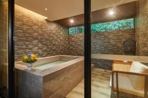 Vannituba majutusasutuses Guangdong Hot Spring Hotel