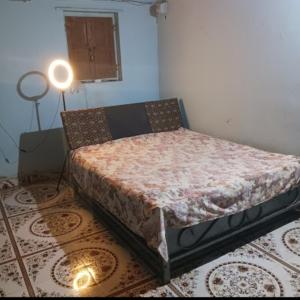 Postel nebo postele na pokoji v ubytování Weekend Holiday Farmhouse & Malshej Junnar Camping Resort