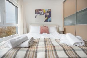 Postel nebo postele na pokoji v ubytování Apartment Adagio