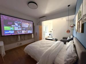 TV a/nebo společenská místnost v ubytování 深圳LaCave公寓