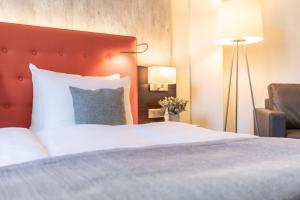 Postel nebo postele na pokoji v ubytování Garner Hotel Berlin - Mitte by IHG