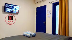 TV in/ali zabaviščno središče v nastanitvi Moshi Moshi