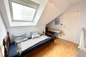 Rúm í herbergi á T3 Duplex Vue mer 180 sur le port de Lomener